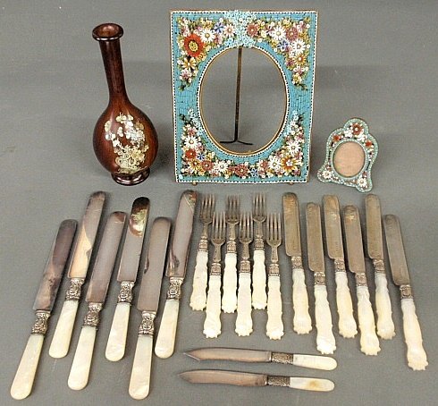 Two micro-mosaic picture frames, largest 8"h.x6.5"w., a: Two micro-mosaic picture frames, largest 8"h.x6.5"w., an assembled 20 pc. set of English silver and mother-of-pearl handles knives & forks and an inlaid exotic wood bud vase 8"h.