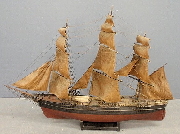 Large clipper ship model of the Lightening with maroon: Large clipper ship model of the Lightening with maroon hull, black sides and canvas sails. 34"h.x50"l.x7"w.