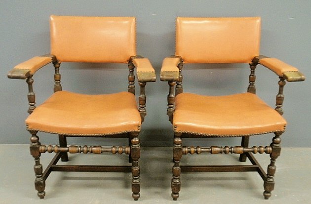 Pair of Jacobean style walnut open armchairs by: Pair of Jacobean style walnut open armchairs by Kittinger. 33"h.x29"w.x16.5"d., seats 17"h.