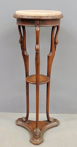 Carved mahogany marble top pedestal with swan: Carved mahogany marble top pedestal with swan decoration. 37"h., top 13.5"dia.