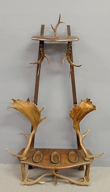 Adirondack style gun rack, maple with moose and stag: Adirondack style gun rack, maple with moose and stag antlers, c.1920. 48.5"h.x31"w.x10.5"d.