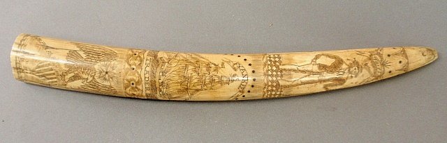 Walrus tusk scrimshaw, 19th c., with a sailor "Faith",: Walrus tusk scrimshaw, 19th c., with a sailor "Faith", ship and whale "Yankee" and American eagle "Trader" and verso with anchor and signed "Thos. Ward". We believe the walrus tusk to be 19th century 
