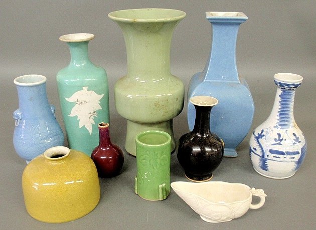 Nine Asian porcelain vases, largest 10"h.x5.5"dia.,: Nine Asian porcelain vases, largest 10"h.x5.5"dia., most 19th c., and a small creamware sauce boat.