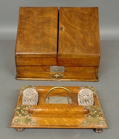 English oak presentation document box, 1887-88, and: English oak presentation document box, 1887-88, and desk set, 1893, presented to Duncan Clarke, Esquire. Box- 11.25"h.x15.5"w., desk set 3.25"h.x12.5"w.