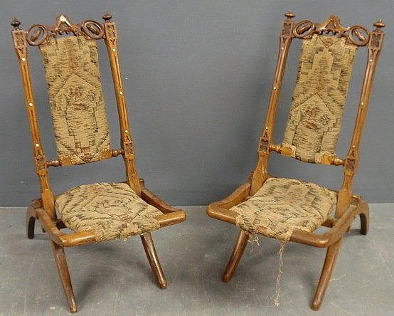 Unusual pair of Victorian carved maple folding deck: Unusual pair of Victorian carved maple folding deck chairs, late 19th c. 30.5"h.x14"w.x26"d., seats 14"h.