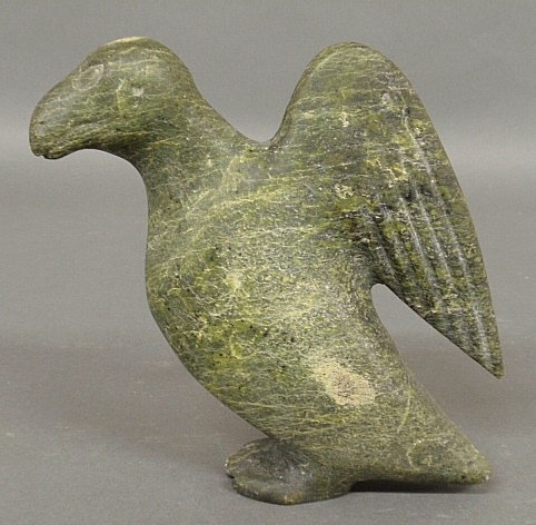 Inuit carved stone sculpture of a standing bird, signed: Inuit carved stone sculpture of a standing bird, signed "Johnny" (Jani). 8"h.x7.5"d.x3"w.