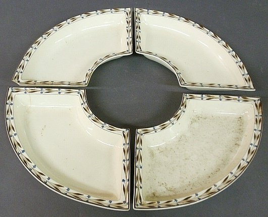 Set of four English creamware crescent shaped dishes, c: Set of four English creamware crescent shaped dishes, c.1800, signed “Herculaneum”. As found. 1.5”h.x14.5”l.x8”w. each