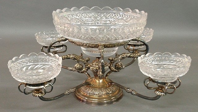 Silverplate epergne, c.1890, with weighted base,: Silverplate epergne, c.1890, with weighted base, crystal center bowl 10"dia. and four smaller bowls. 9.5"h.x21"dia.