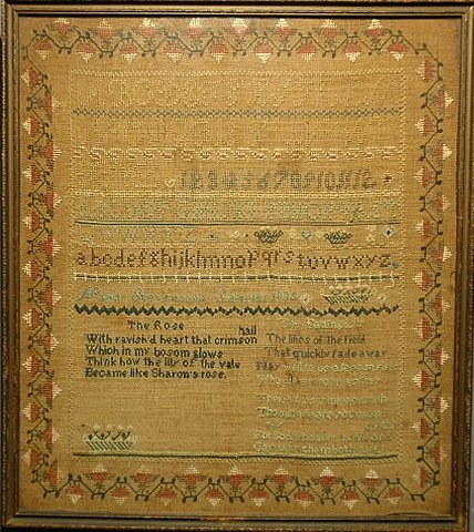 Silk on linen sampler wrought by "Nancy S_____ 1835',: Silk on linen sampler wrought by "Nancy S_____ 1835', with ABC's, "The Rose" and "Fading Lily" verses and strawberry border. Site- 16.75"x14.75"