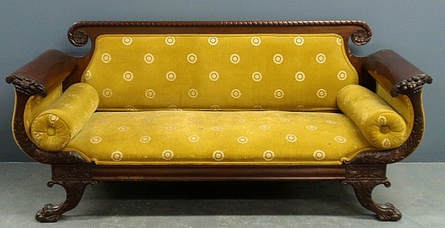 Empire mahogany sofa with rosette carved back, acanthus: Empire mahogany sofa with rosette carved back, acanthus carved arm supports and paw feet. 36"h.x79"w.x28"d., seat 15"h.