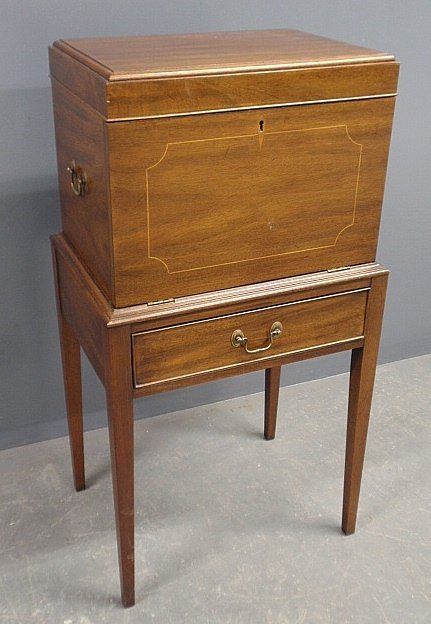 Hepplewhite style mahogany silver chest by: Hepplewhite style mahogany silver chest by Henkle-Harris, with lift lid and three drawers. 40.25"h.x21"w.x15.5"d.