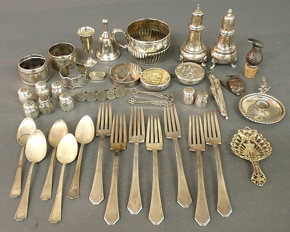 Group of sterling silver tableware and flatware TI: Group of sterling silver tableware and flatware TI napkin rings, salt & pepper shakers, cup, spoons, forks, etc. 40 troy oz.