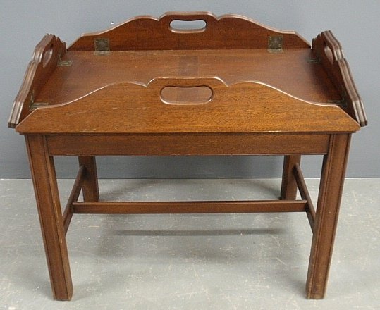 Chippendale style mahogany butler's tray table with: Chippendale style mahogany butler's tray table with label "Marlboro Manor Fine Furniture by Sacks". 18"h., top 26"x18"