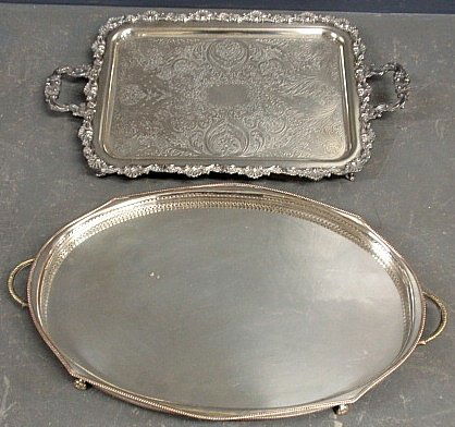 Two silverplate Chippendale style serving trays. Each: Two silverplate Chippendale style serving trays. Each approx. 1.5"h.x28"x17"