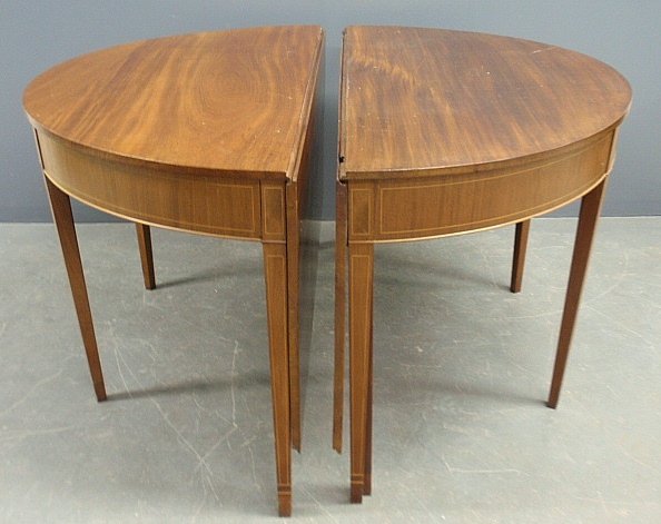 Hepplewhite style mahogany two-part banquet table,: Hepplewhite style mahogany two-part banquet table, probably Centennial, lacking clips. 30"h.x53"w.x95"l. fully extended