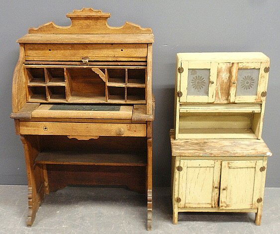 Child's oak roll-top desk, 41"h.x25"w.x15"d., and a: Child's oak roll-top desk, 41"h.x25"w.x15"d., and a miniature Dutch cupboard 32"h., both pieces as found.