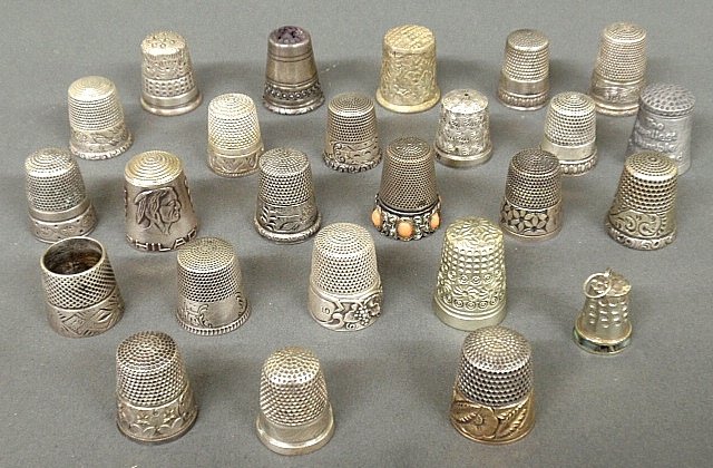 Twenty-five sterling and English silver thimbles. 3.82: Twenty-five sterling and English silver thimbles. 3.82 troy oz.
