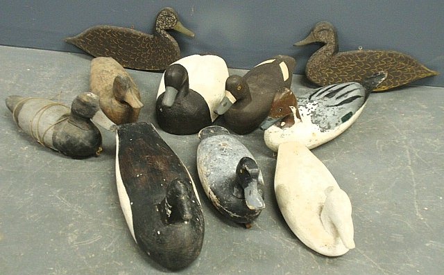 Ten duck decoys incl. some by Reuben C. Corlies,: Ten duck decoys incl. some by Reuben C. Corlies, (1882-1976) Manahawkin, NJ, largest 7"h.x18"l.
