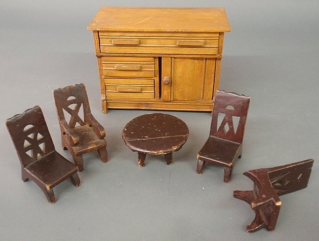 Miniature maple Eastlake style commode cabinet: Miniature maple Eastlake style commode cabinet 8.5"h.x9"w.x4.5"d. and a miniature round table and 4 chairs, as found.