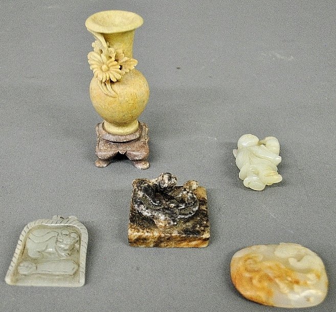Four small Chinese carved jade pieces to incl. a belt: Four small Chinese carved jade pieces to incl. a belt buckle 2"x1.75", and a carved soapstone vase 4"h.