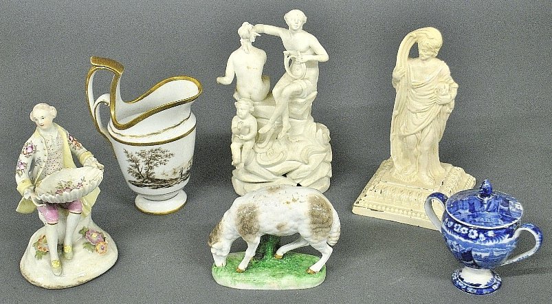 Misc. group of porcelains to incl. a Chelsea sheep: Misc. group of porcelains to incl. a Chelsea sheep 4"h.x5"l., Parian ware figural group 8.5"h., porcelain creamer 7"h., etc. Six pieces
