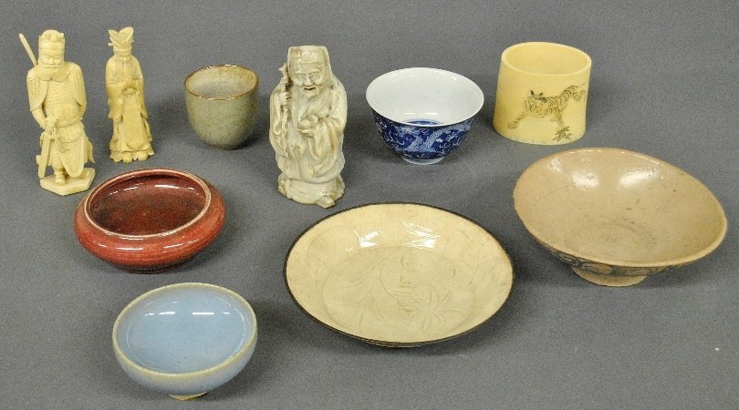 Ten pieces of Chinese and Korean porcelain and: Ten pieces of Chinese and Korean porcelain and earthenware to incl. a blue bowl with dragon decoration, white glazed bowl w/metal rim 1.5"h.x6.75"dia. two carved bone figures, etc.
