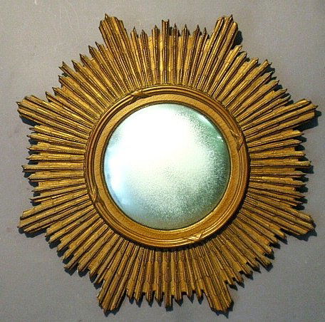 Carved gilt sunburst convex mirror, c.1940, also known: Carved gilt sunburst convex mirror, c.1940, also known as a "Poison Mirror". 29”dia.