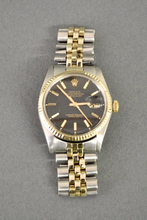 Rolex men's Oyster Perpetual DateJust wristwatch, two-t: Rolex men's Oyster Perpetual Datejust wristwatch, two-tone with stainless steel and 14k gold trim, black face. 36mm