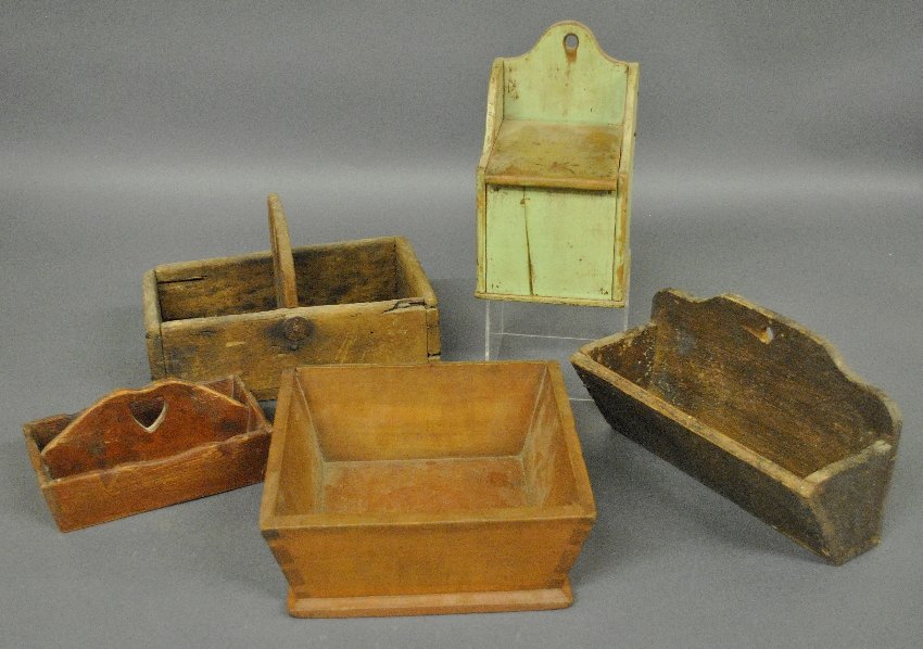 Five pieces of 19th c. wooden kitchenware incl. a: Five pieces of 19th c. wooden kitchenware incl. a saltbox 9"h., small divided cutlery box with heart shaped handle 7.5"w., etc.