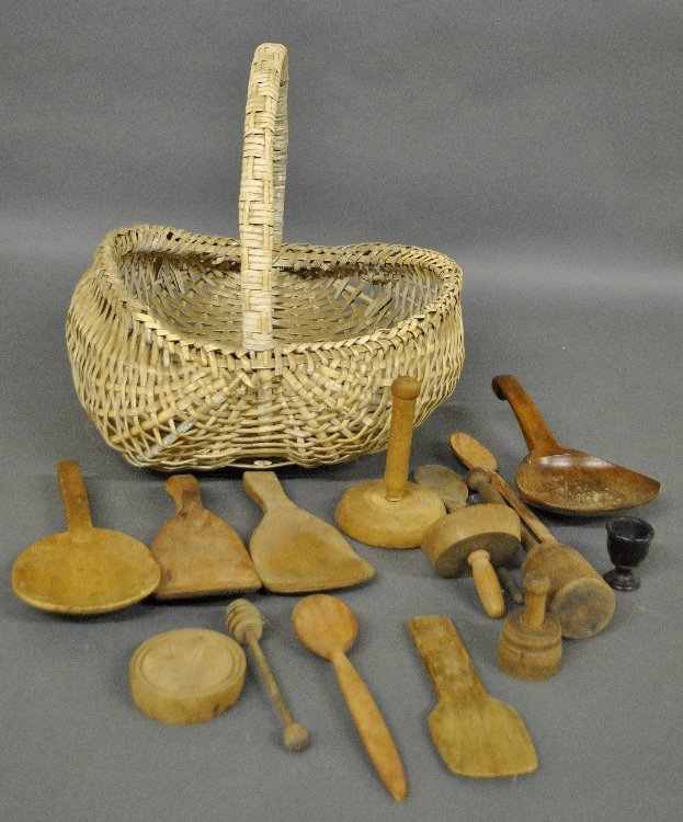 Group of 19th c. wooden kitchenware to incl. butter: Group of 19th c. wooden kitchenware to incl. butter prints, spoons, dough paddles, etc. and a large wood basket.