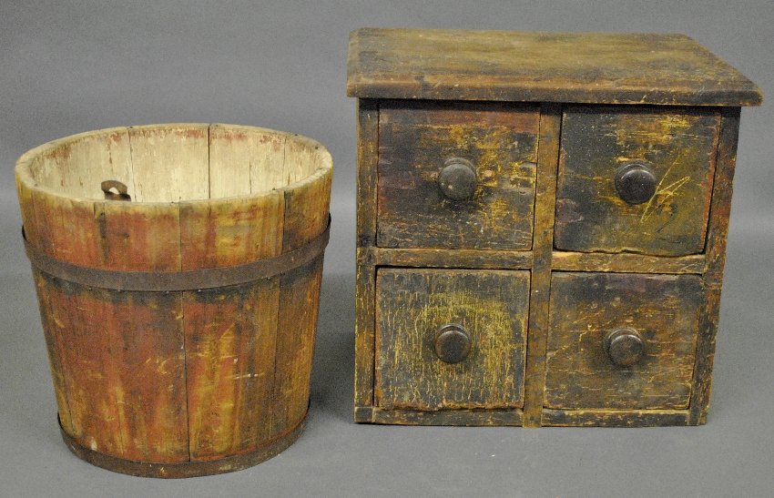 Primitive pine four-drawer storage box, 19th c.,: Primitive pine four-drawer storage box, 19th c., 14"h.x15'w., and a staved sap bucket in old red paint 11"h.