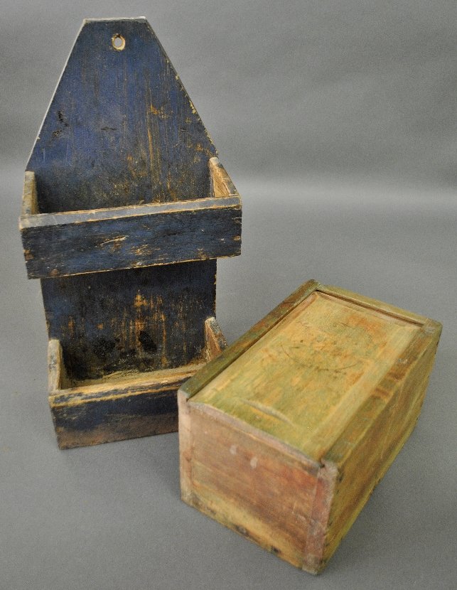 Primitive 19th c. pine slide-lid box with traces of old: Primitive 19th c. pine slide-lid box with traces of old green paint. 7"h.x11.5"l., and a blue painted hanging shelf 21"h.