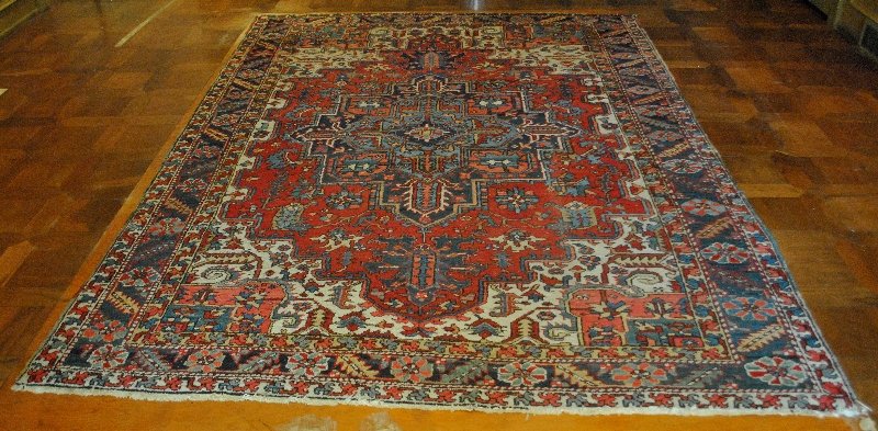 Room size Heriz oriental carpet with red field. (1 of 3)