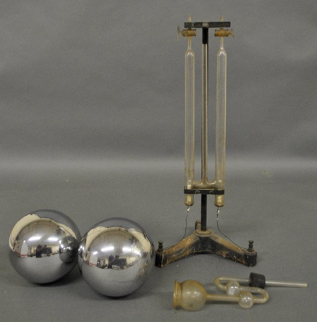 Four glass scientific objects, the largest having a (1 of 1)