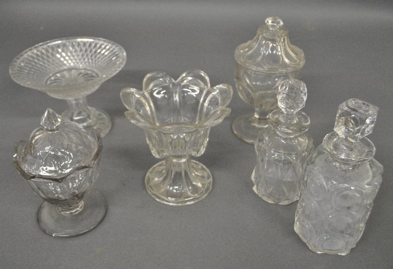 Six pieces of flint glass to incl. covered compotes,: Six pieces of flint glass to incl. covered compotes, tallest 8.5"h., and pressed glass bottles, etc.