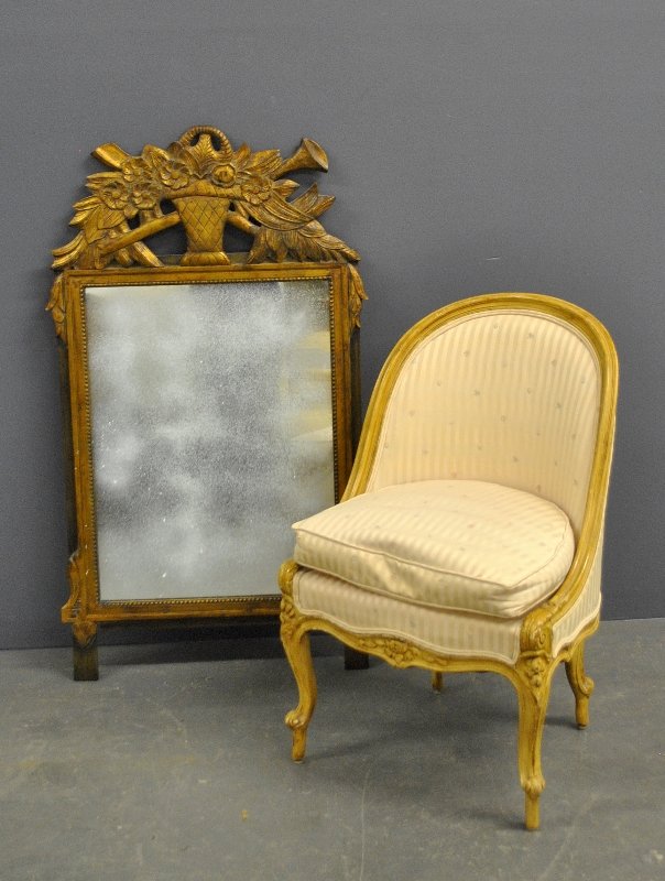 French style carved mirror, 45"h x 25"w, and a French: French style carved mirror, 45"h x 25"w, and a French style slipper chair.