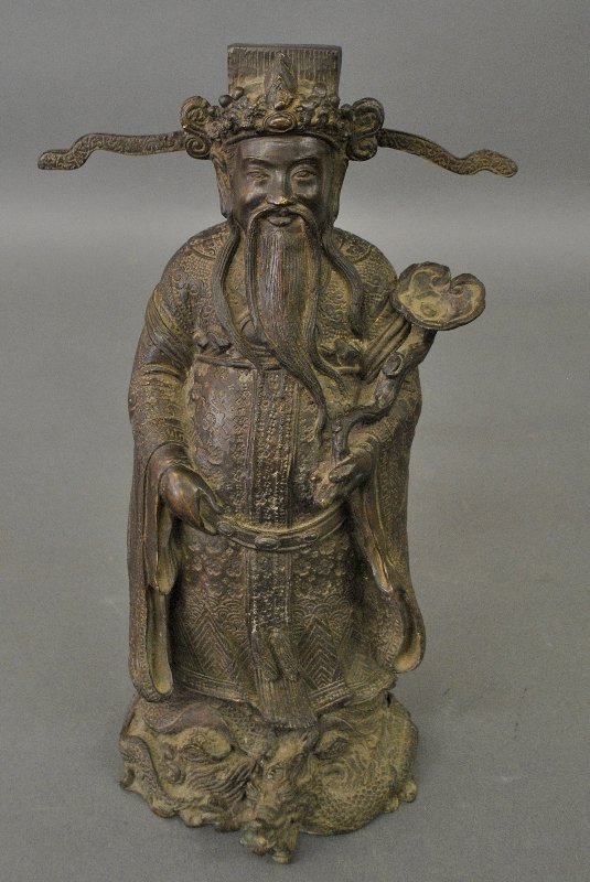 Chinese bronze figure of a scholar holding a Ruyi: Chinese bronze figure of a scholar holding a Ruyi scepter. 15"h.x9"w.