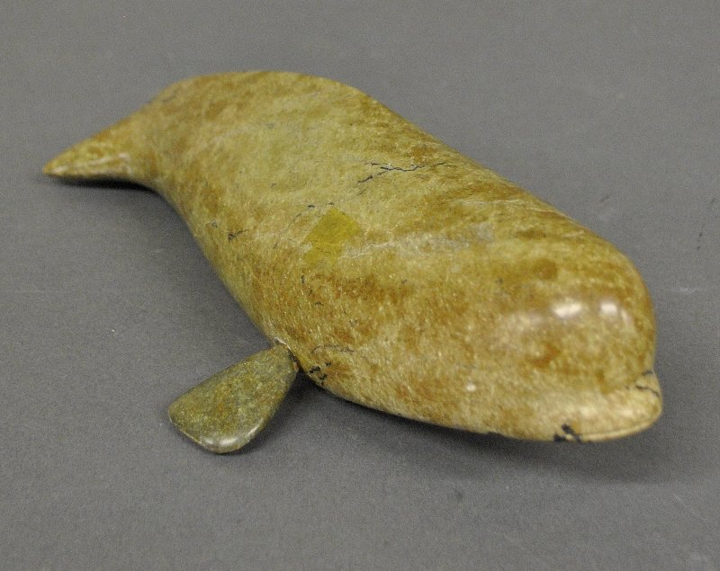 Inuit carved stone whale. 3.5"h.x12"l.: Inuit carved stone whale. 3.5"h.x12"l.
