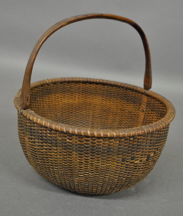 Nantucket basket signed “A.O. Crawford”. (1 of 2)
