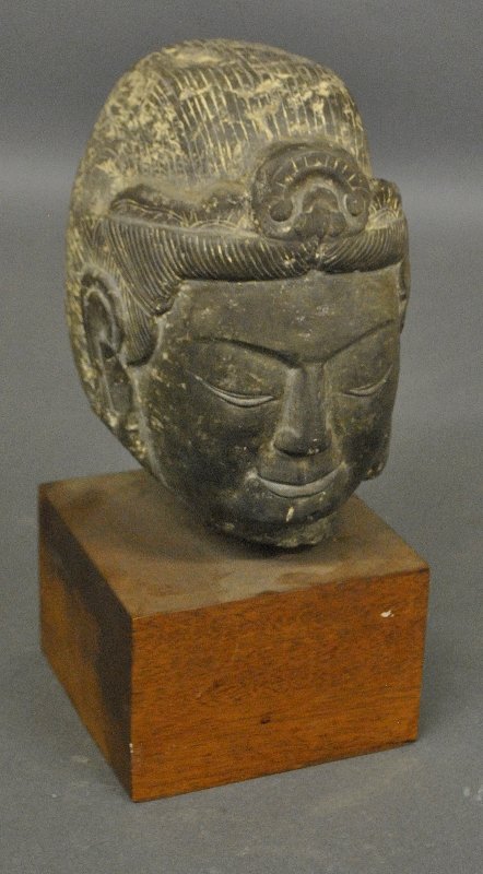 Ancient carved stone Buddha head mounted on a mahogany (1 of 5)