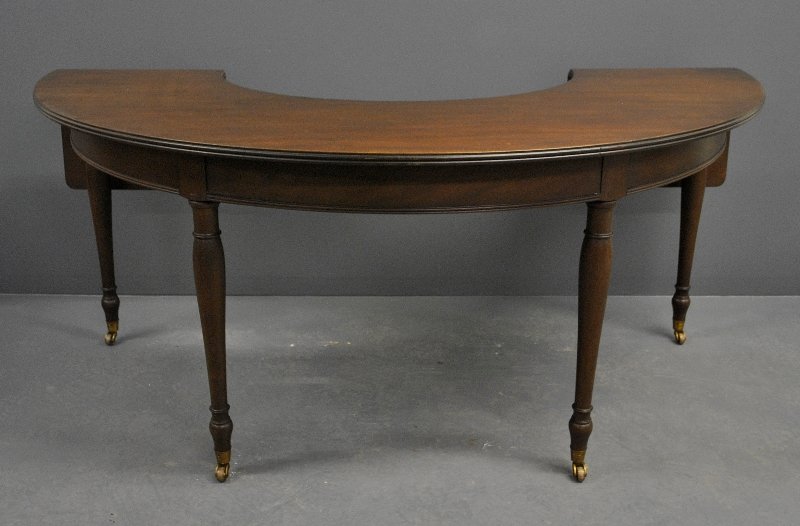 Kittinger labeled mahogany one-drawer wine tasting: Kittinger labeled mahogany one-drawer wine tasting table on brass casters. 29.5"h.x70"w.