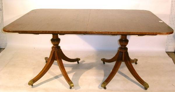 Duncan Phyfe style inlaid mahogany double-pedestal: Duncan Phyfe style inlaid mahogany double-pedestal base banquet table with two extra leaves, 22.25"ea. As found. 67"l.x46.5"w.