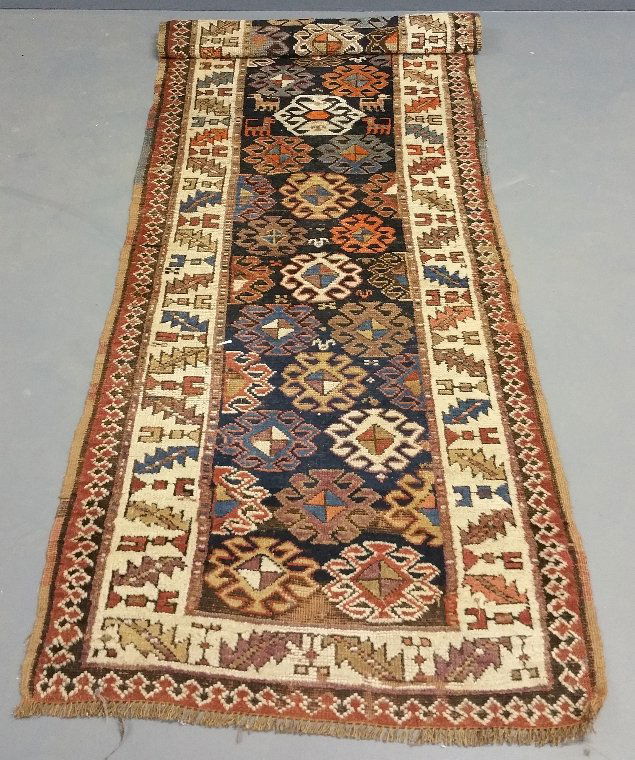 Kazak style tribal hall runner. 9'11" x 3'11" (1 of 3)