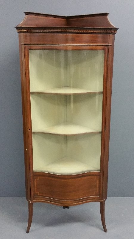 Mahogany inlaid bow-front curio cabinet, circa 1900. (1 of 2)