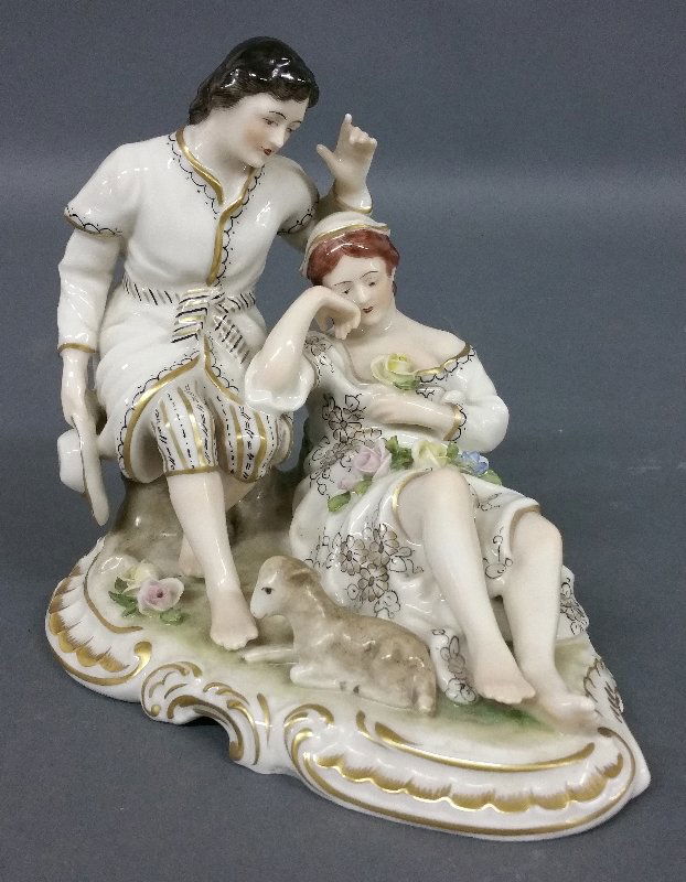 Porcelain of a couple signed "Dresden." 5 Â½" h x 6" l (1 of 2)