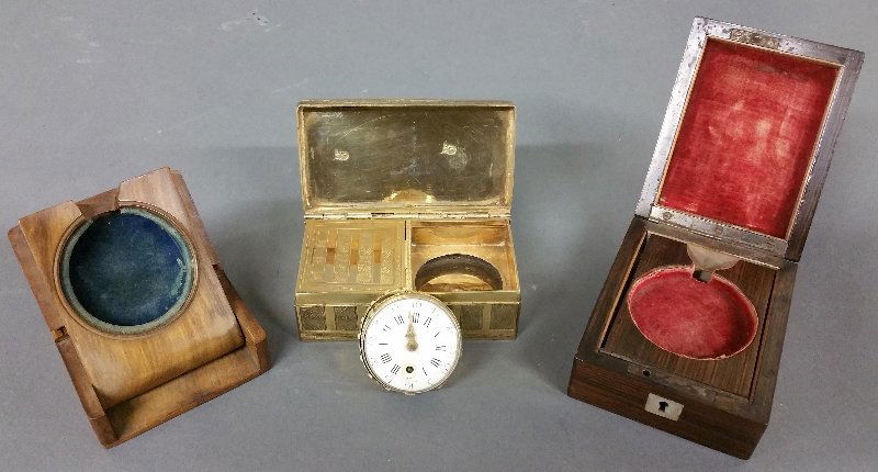 Gold metal cased traveling box with key wind watch, and (1 of 2)