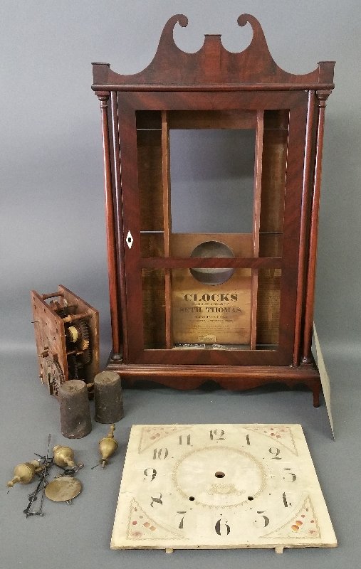 Seth Thomas labeled mahogany pillar and scroll clock (1 of 3)