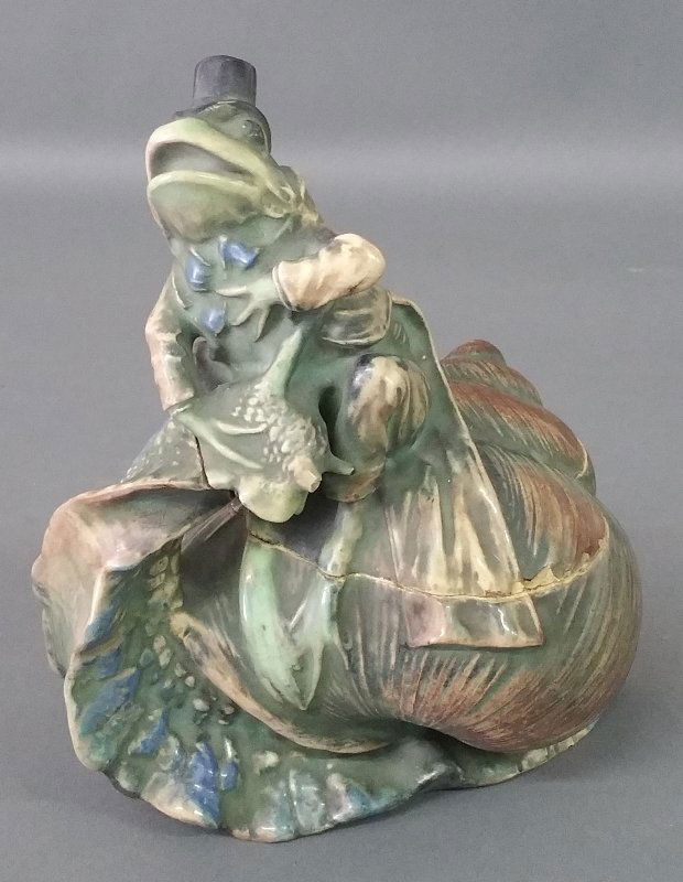 Amphora pottery depicting a frog riding a snail. 9 ½ (1 of 3)