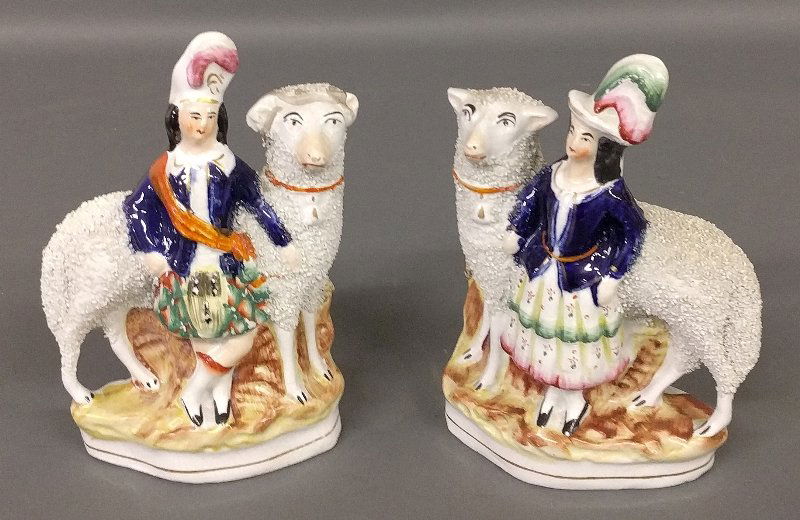 Pair of Staffordshire figural groups of children with (1 of 2)