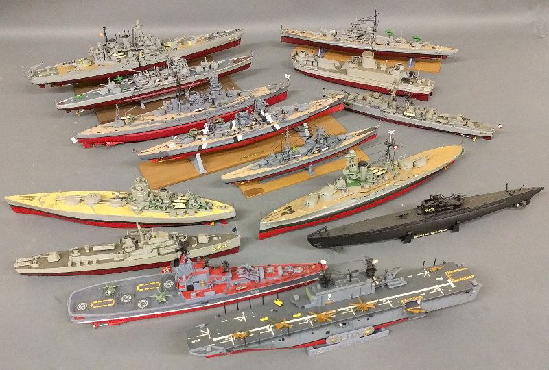 Grouping of approx. fourteen ship models to include Gne: Grouping of approx. fourteen ship models to include Gneisenau and Scharnhorst. As found. Largest: 18 inches long.